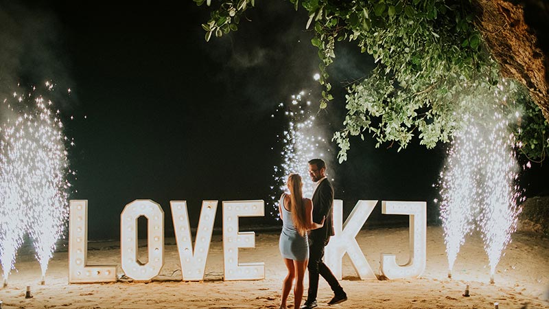 Proposal photo shoot of Ahmed and Katty, a couple from Dubai. Taken on the surprise romantic dinner inside a beach cave at Samabe Resort, Nusa Dua.